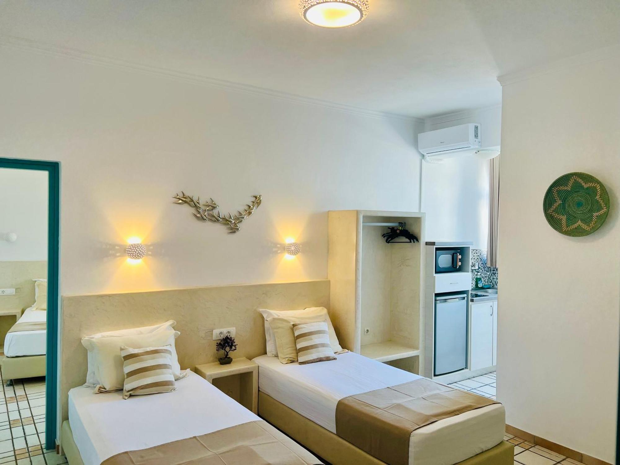 Arapiou Apartments Playa de Perivolos Habitación foto